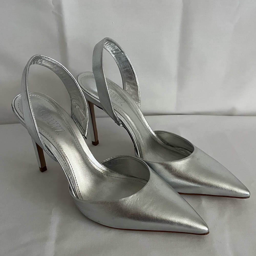 Schutz. Size 7. Silver Slingback Heels.